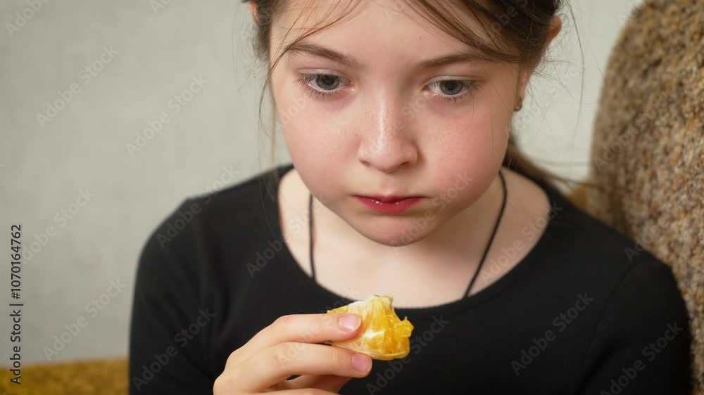 Close up girl eating juicy healthy orange. Young girl enjoying fresh nutritious orange. Child savoring ripe vitamin-rich orange portrait Close up girl eating juicy healthy orange. Young girl enjoying fresh nutritious orange. Child savoring ripe vitamin-rich orange portrait