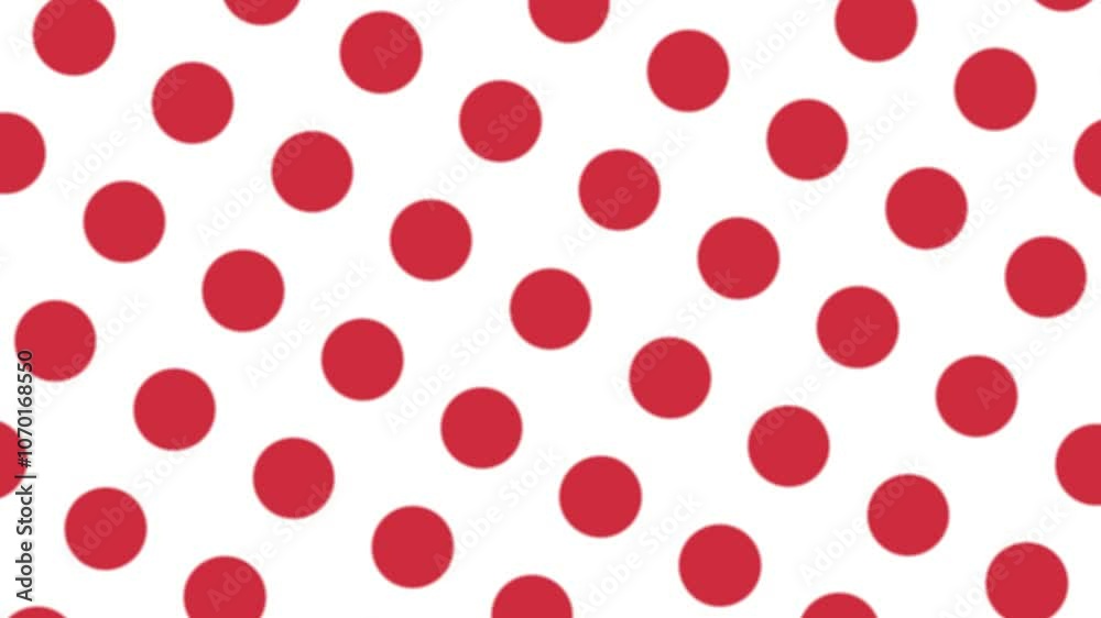 A red and white polka dot pattern. The red dots are scattered throughout the white background. The pattern is very simple and clean