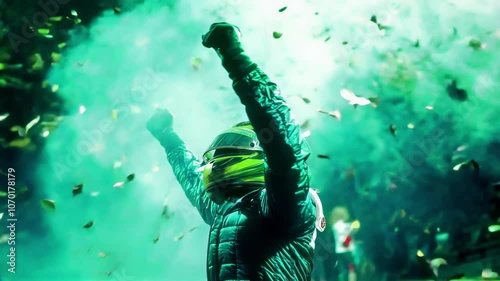 Silhouette of race car driver celebrating victory in the race against bright stadium lights,  falling confetti, a flock of fans and smoke. 3d animation
