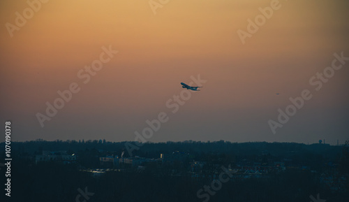 A plane taking of at sunset