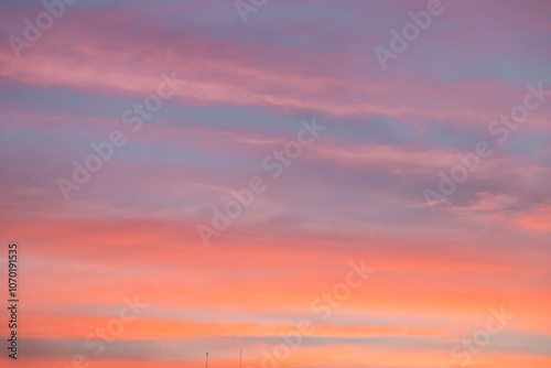 Beautiful Sunset with Pink and Blue Sky over Church and City Landscape – Peaceful and Cozy Atmosphere 