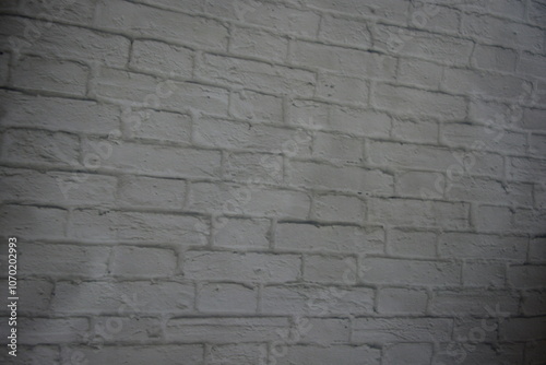 Construction, unusual imitations and drawings on fabric, fabric material. Beautiful masonry of gray, white bricks on a fabric background. photo