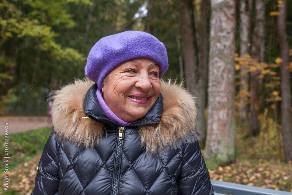 Portrait of happy senior woman in blue hat outdoor Portrait of happy senior woman in blue hat outdoor