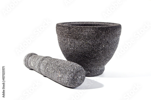 Traditional stone pestle and mortar, usually used to pound cooking spices, or herbs to mix medicine.