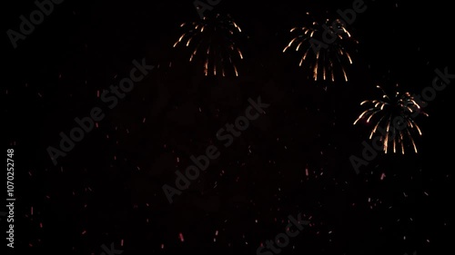 New Year's holiday fireworks of golden color. Animation. Rear background.