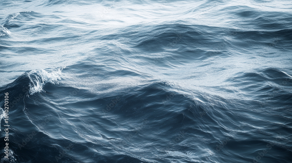 Fototapeta premium Close-up of ocean waves with dark blue tones.