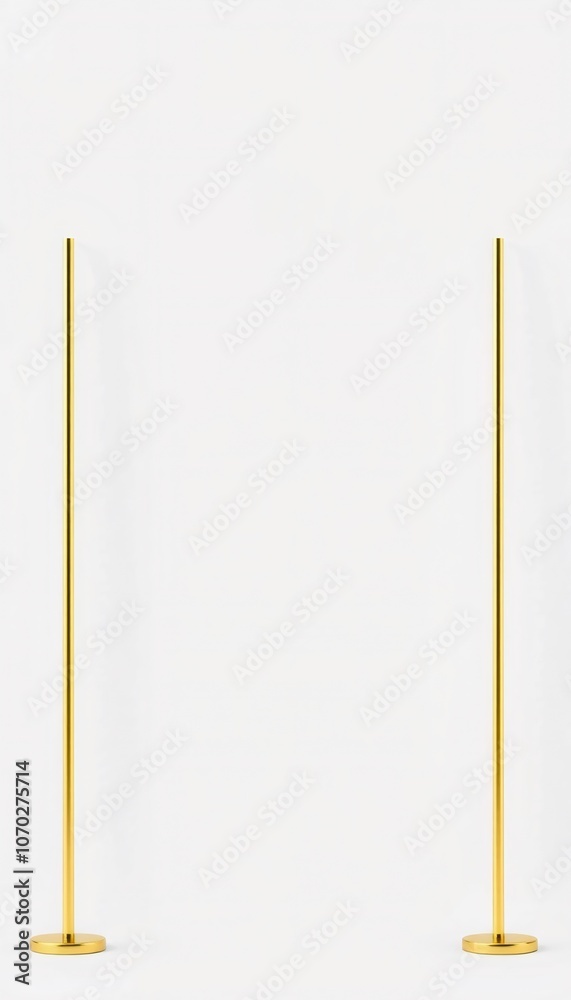 Two tall, thin, gold poles with circular bases standing on a white background. Two tall, thin, gold poles with circular bases standing on a white background.
