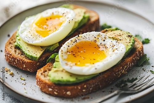 Delicious avocado toast topped with perfectly poached eggs, garnished with pepper on a gray plate in a cozy kitchen setting. Generative AI