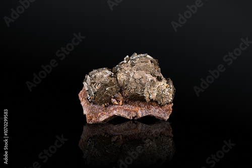 Marcasite aggregate. Specimen from Seilles, Andenne, Belgium. photography isolated on black background. macro detail close-up mineral crystal unpolished semi-precious gemstone. photo