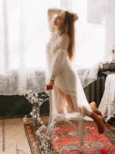 Attractive woman, wearing vintage style pastel dress indoor.