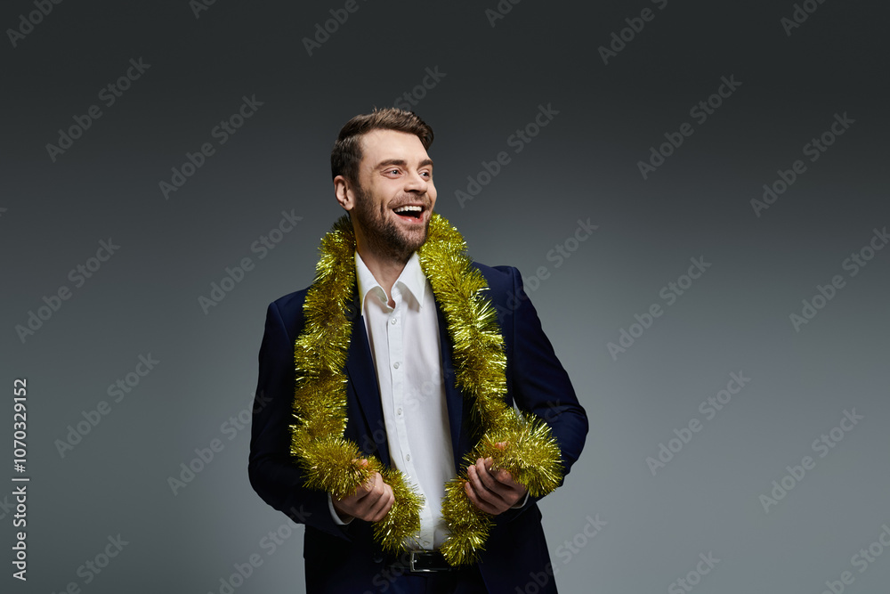 A joyful young man adorned with festive decorations celebrating a cheerful occasion indoors A joyful young man adorned with festive decorations celebrating a cheerful occasion indoors