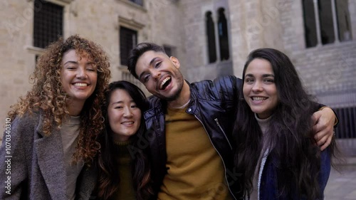 Winter, Diverse group of people having fun together outside university college, Happy friends of different ethnicity looking at camera