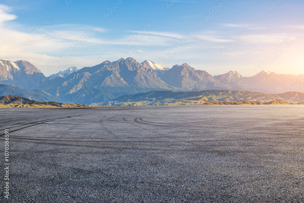 Asphalt road square and mountain natural landscape at sunset. car background.