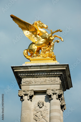 Alexander III Bridge in Paris, France. Winged horse statue. Architectural detail. 