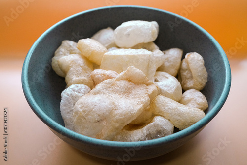 a bowl of kerupuk kulit, Indonesian traditional snack