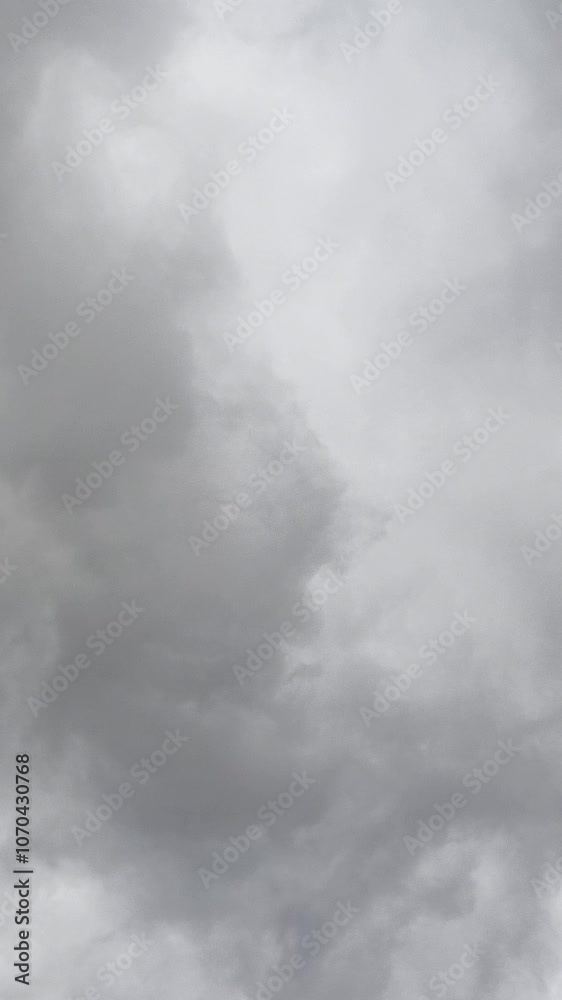 Gray rain clouds are moving continuously