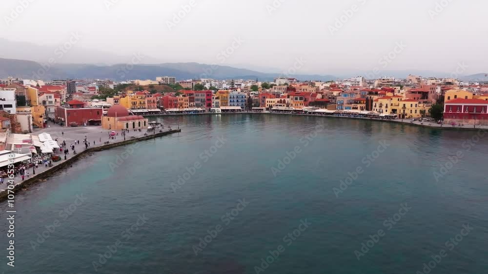 Beautiful Old city, Greece and best scenic places - panorama of picturesque old town Chania. Crete island, Panoramic of the old Venetian port and lighthouse during the blue hour, Travel Concepts Beautiful Old city, Greece and best scenic places - panorama of picturesque old town Chania. Crete island, Panoramic of the old Venetian port and lighthouse during the blue hour, Travel Concepts
