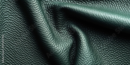 Wallpaper Mural Deep green leather with a textured appearance serves as the backdrop. This dark green leather background features a tactile quality and rich hue, emphasizing its unique texture. Torontodigital.ca