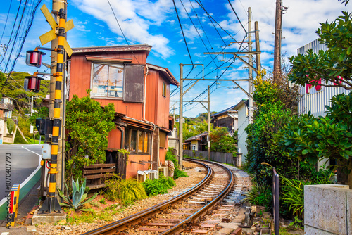 Kamakura's famous cafe next to the train tracks, sit or stand and eat food or drink and watch the trains pass by up close Japan