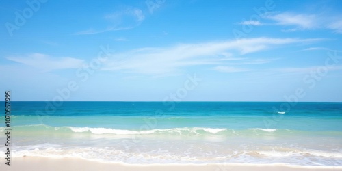 Beautiful, serene summer beach scene with clear blue skies, gentle waves, golden sand, and palm trees in the background, leisure, blue skies