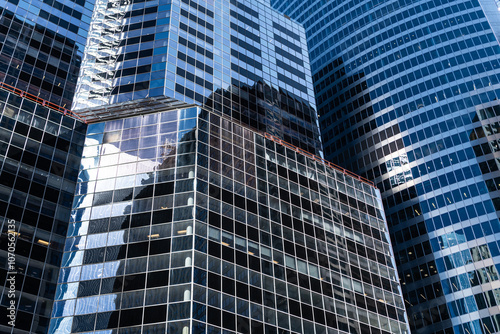 Architecture background. Glass building window. Architectural detail. Background of detailed architecture. Modern business office. Business building. Building facade architecture. Geometrical shape