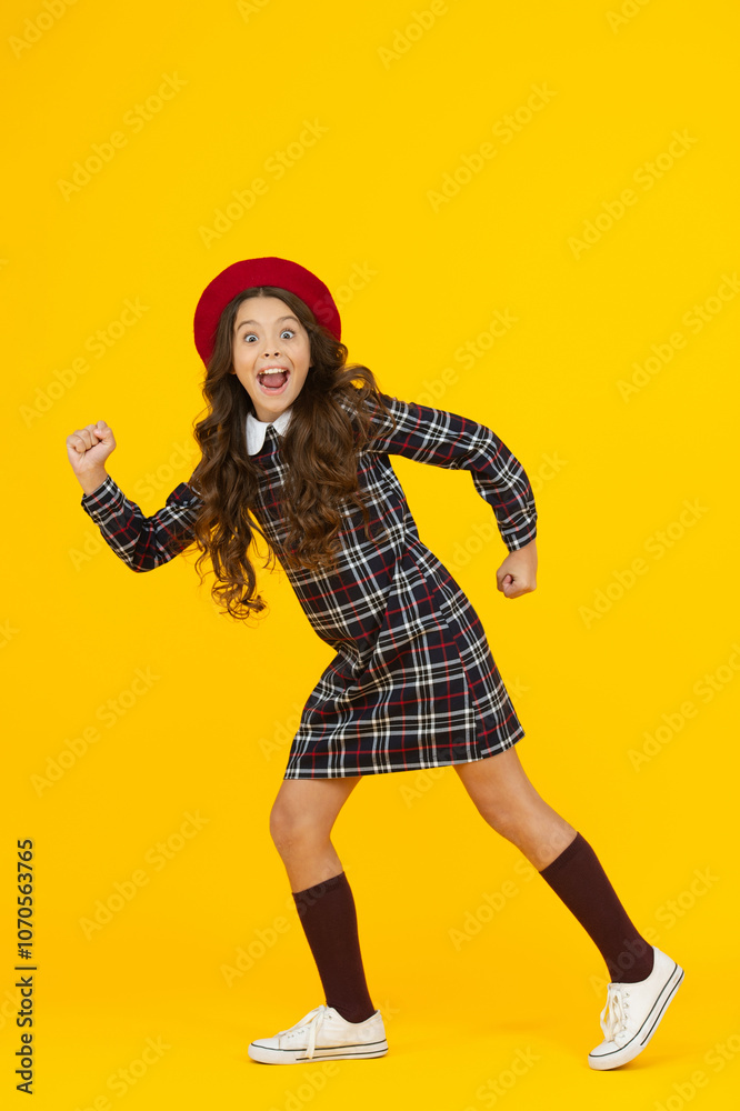 Autumn time to study. Knowledge and education. School education. Students life. Back to school. Girl hurrying in school uniform. Education for adolescence. Teen girl in a hurry isolated on yellow Autumn time to study. Knowledge and education. School education. Students life. Back to school. Girl hurrying in school uniform. Education for adolescence. Teen girl in a hurry isolated on yellow