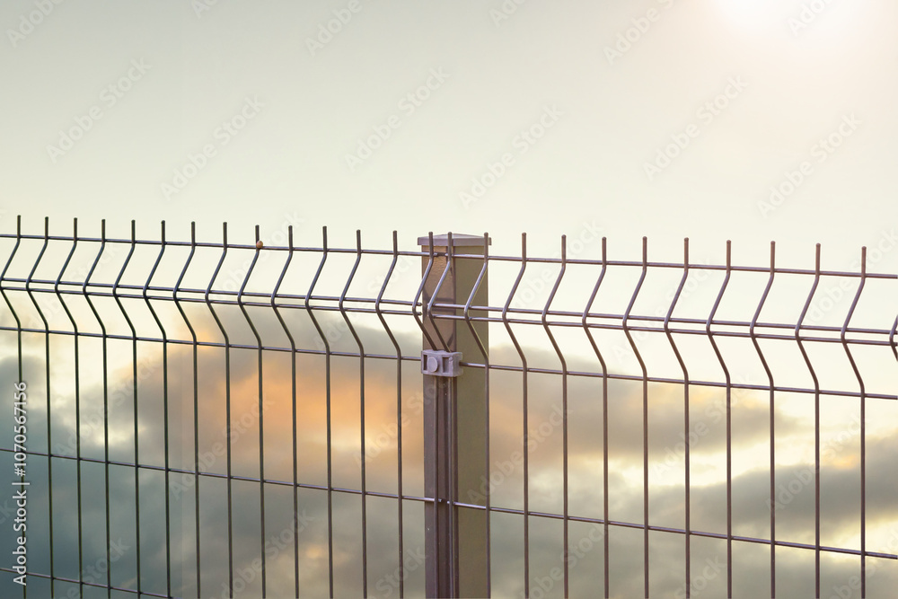 grating wire industrial fence panels, pvc metal fence panel and sunset sky
grating wire industrial fence panels, pvc metal fence panel and sunset sky