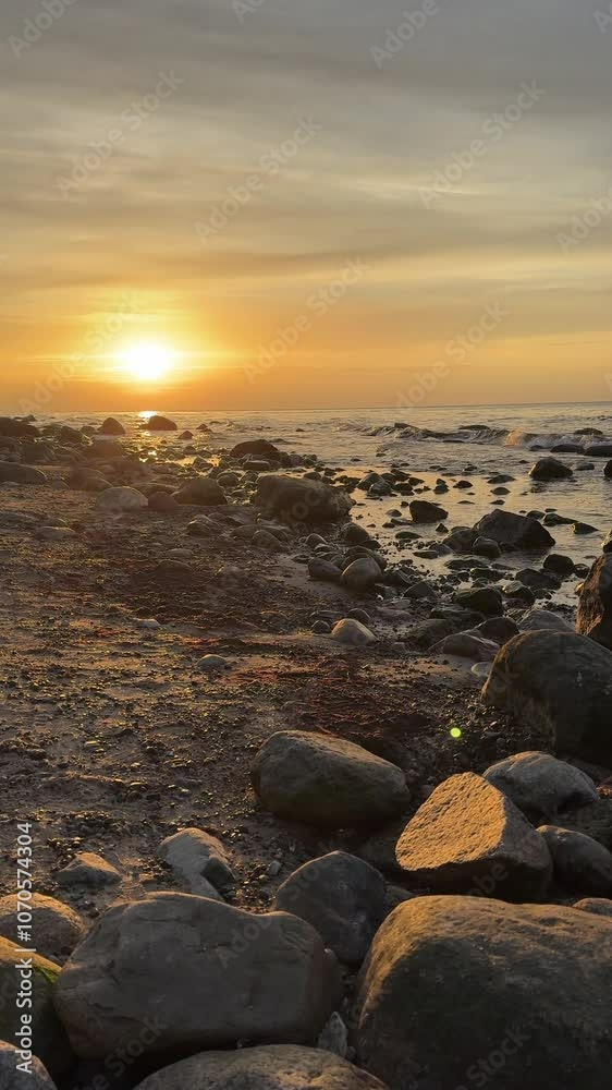 sunset on the beach with rocks on the baltic sea, island Rügen in Germany Cap Arkona 4k sunset on the beach with rocks on the baltic sea, island Rügen in Germany Cap Arkona 4k