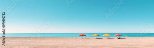 A panoramic view of Senigallia's sandy beaches and colorful umbrellas by the Adriatic Sea under a clear blue sky