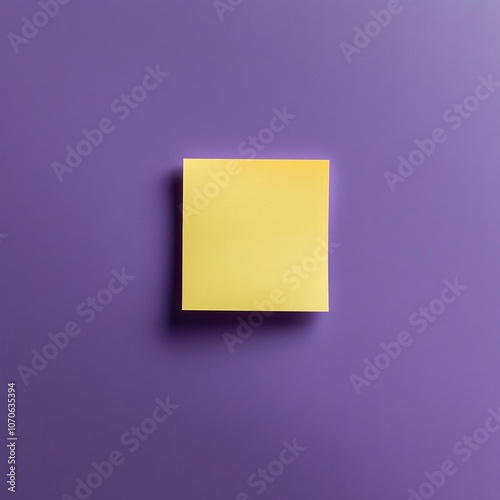 Minimalistic yellow sticky note on purple background for office concepts