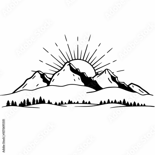 Snowy mountain range with sun rising behind peaks