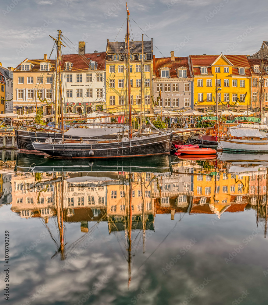 Panorama of Copenhagen New Harbour and its picturesque buildings reflected in the water