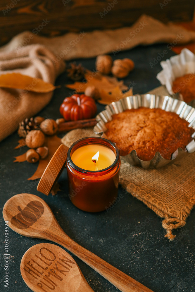 Burning candle with pumpkin pie scent, cozy autumn Burning candle with pumpkin pie scent, cozy autumn