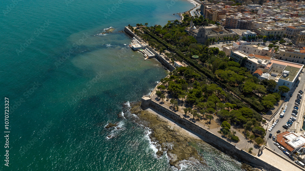 Obraz premium Aerial view of the municipal park of Trani, in Puglia, Italy. It is a small park located on the seafront of the city.