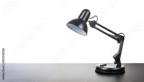 A sleek, modern metallic desk lamp poised gracefully against a plain white background, showcasing its stylish design and functionality perfect for office or home workspaces.