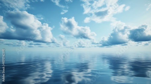 A tranquil sky with soft clouds reflecting on calm waters during a serene afternoon by the coast