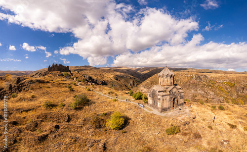 Aerial view of ancient destroyed fortress of Amberd and Vahramashen Church on Mount Aragats on sunny day. Popular tourist and historical attraction and landmark. Aragatsotn Province, Armenia. Europe. photo