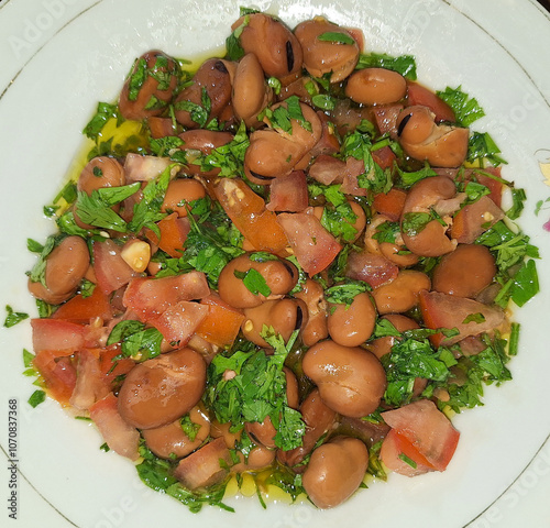 Ful medames or simply foul, is a dish of cooked fava beans served with vegetable oil, lemon It is a popular food in Arab countries.