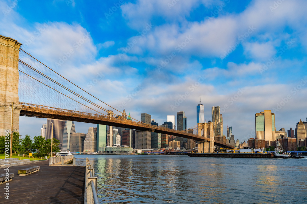 Architecture of historic bridge in Brooklyn. Way to Manhattan. Brooklyn bridge in New York. Manhattan cityscape. Amazing scenery of Brooklyn bridge over skyscraper in New York. NY city Architecture of historic bridge in Brooklyn. Way to Manhattan. Brooklyn bridge in New York. Manhattan cityscape. Amazing scenery of Brooklyn bridge over skyscraper in New York. NY city