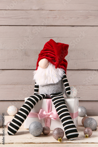 Christmas gnome with gift b...