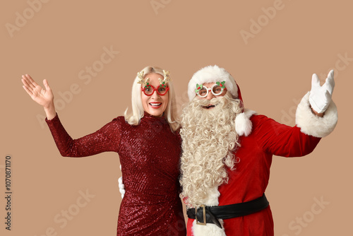 Santa Claus and beautiful m...