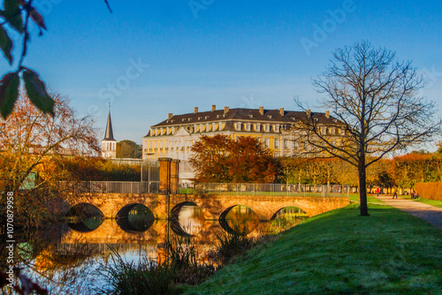 Baroque Palace with Reflecting Pool on a Sunny Day photo