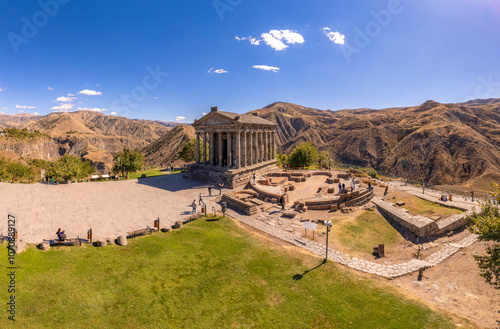 Aerial view of famous Garni pagan temple with Ionic-colonnaded. Historic Greek style building is located on gorge. Built in I century AD by Armenian king Trdat. Ancient Khosrov Reserve, Armenia Europe