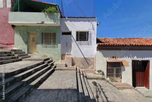 Escalinata Padre Pico Stairway cobbled steps along -south to north- the homonymous street from Corvacho Hill to Tivoli Neighborhood. Santiago-Cuba-542 photo