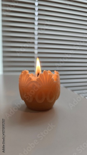 Burning candle. Meditation. Candle with patterns
