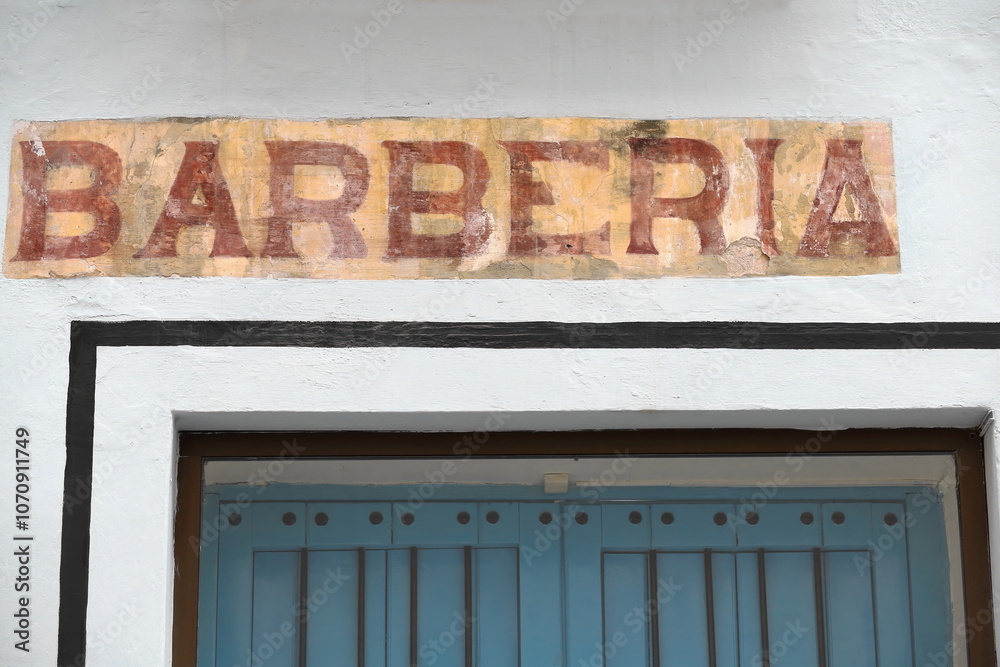 Signboard on 70 Calle Amargura Street corner with Calle San Ignacio Street, former barberia -barbershop- now a pet shop, Habana Vieja. Havana-Cuba-705 Signboard on 70 Calle Amargura Street corner with Calle San Ignacio Street, former barberia -barbershop- now a pet shop, Habana Vieja. Havana-Cuba-705