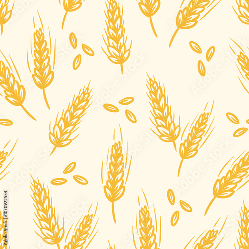 Seamless pattern golden wheat ears and grains against a light backdrop.