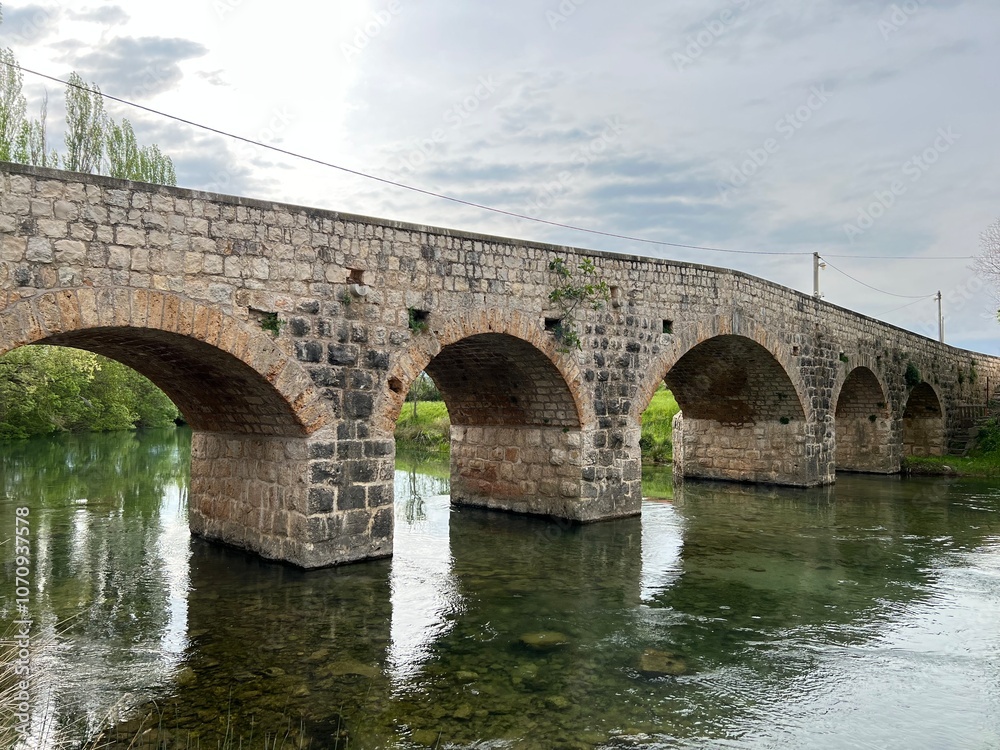 Historic stone bridge on the river Zrmanja, Kastel Zegarski (Velebit Nature Park, Croatia) - Povijesni kameni most na rijeci Zrmanji, Kaštel Žegarski (Park prirode Velebit, Hrvatska) Historic stone bridge on the river Zrmanja, Kastel Zegarski (Velebit Nature Park, Croatia) - Povijesni kameni most na rijeci Zrmanji, Kaštel Žegarski (Park prirode Velebit, Hrvatska)