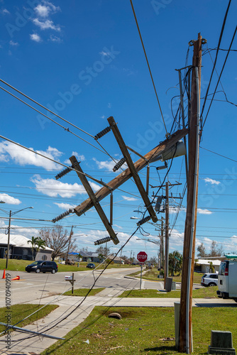Wallpaper Mural Hurricane Ian Aftermath Fallen Power lines against a blue sky Torontodigital.ca