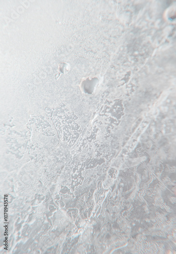 Obraz na plátně A close-up of a frosty windowpane with intricate patterns of ice